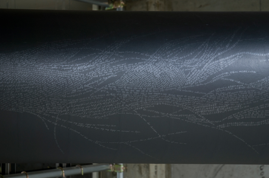 6_Minha LEE_The Monument_detail view (tail)_pencil on black paper tube_7 holy scripts and 15 languages_Ø50x400cm_2008